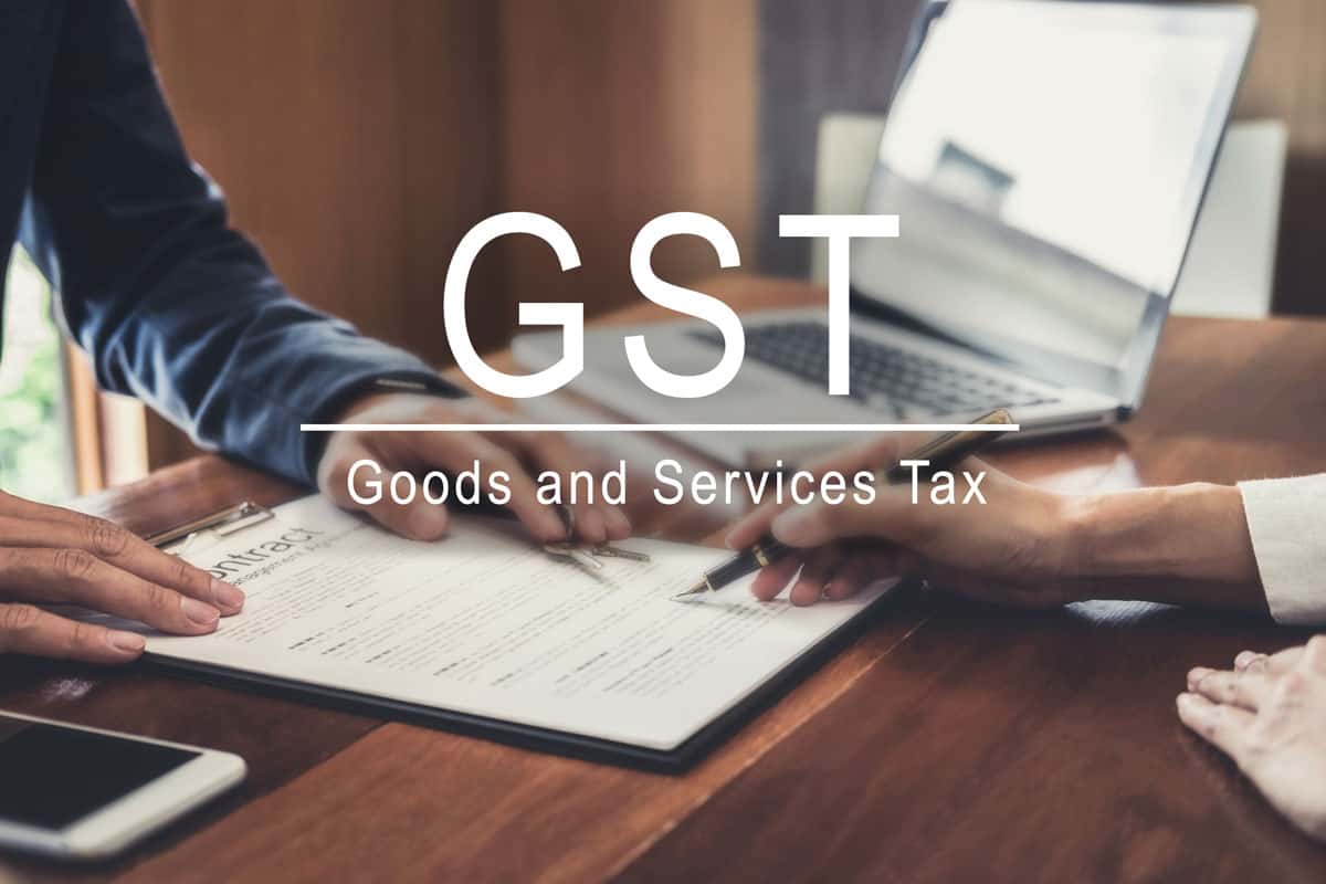 goods and services tax words overlaying signing of property sales considered part of exempt supplies under Singapore GST legislation