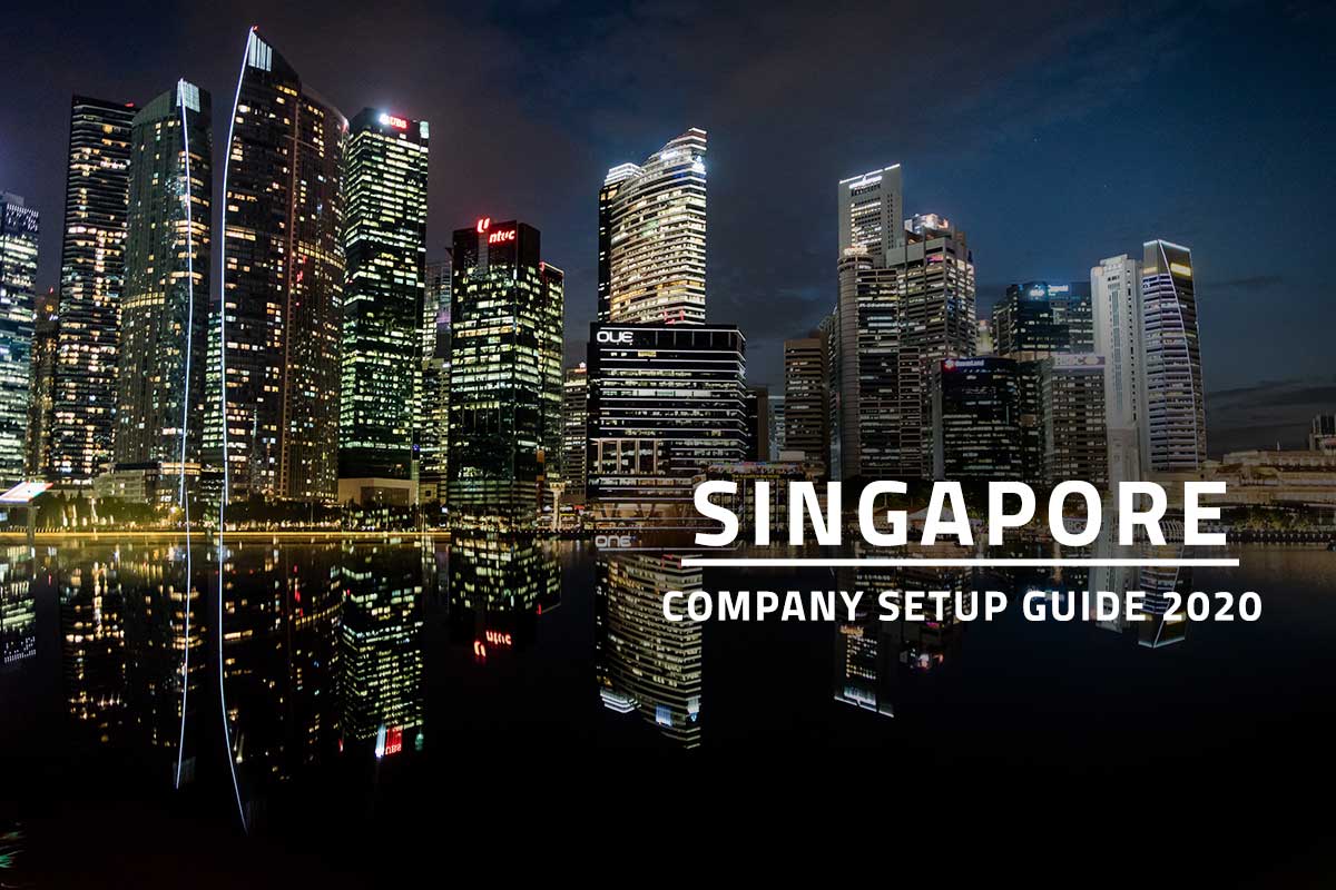 featured image for how to open a company in Singapore with white text Singapore company setup guide 2020 against background of Singapore cityscape at night
